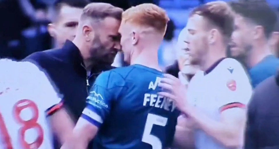 Evatt went on the pitch to talk to the referee but ended up in a row with Shrewsbury defender Morgan Feeney