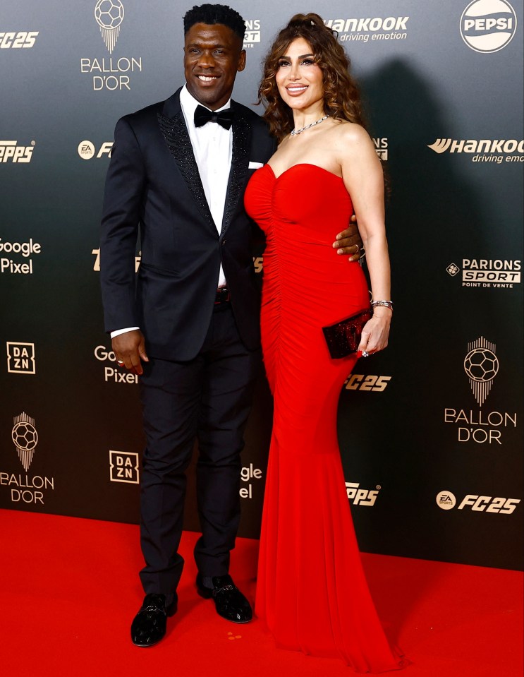 Champions League legend Clarence Seedorf with partner Sophia Makramati