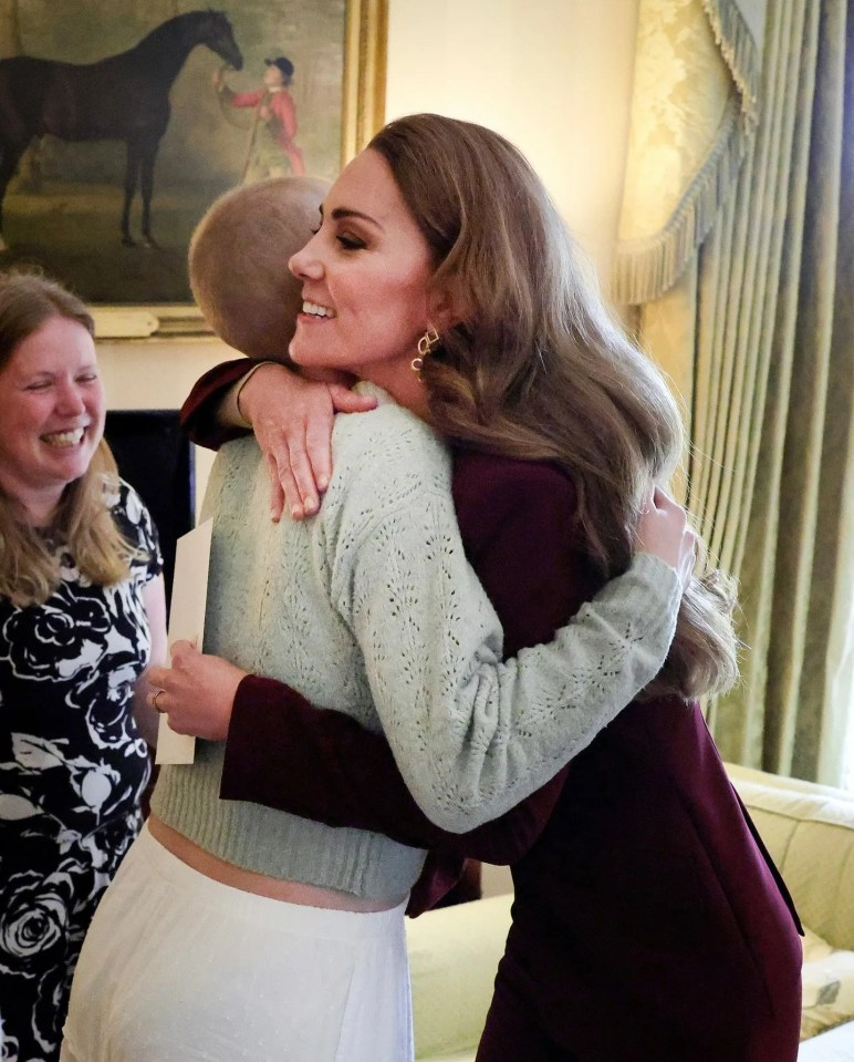 Princess Kate hugging a sixteen-year-old girl battling cancer today