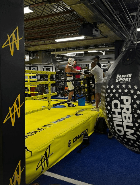 a boxing ring with a bag that says problem child on it