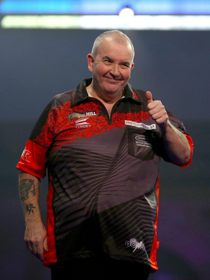 Phil Taylor reacting during day fourteen of the William Hill World Darts Championship at Alexandra Palace, London. PRESS ASSOCIATION Photo. Picture date: Saturday December 30, 2017. See PA story DARTS World. Photo credit should read: Steven Paston/PA Wire. RESTRICTIONS: Use subject to restrictions. Editorial use only. No commercial use.