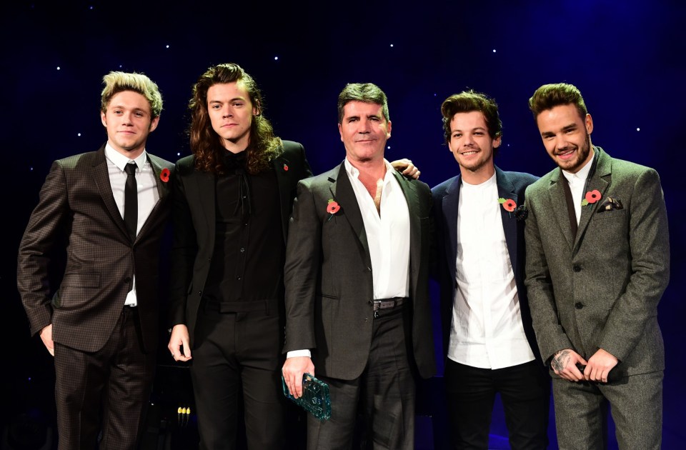 Simon Cowell with One Direction - minus Zayn Malik