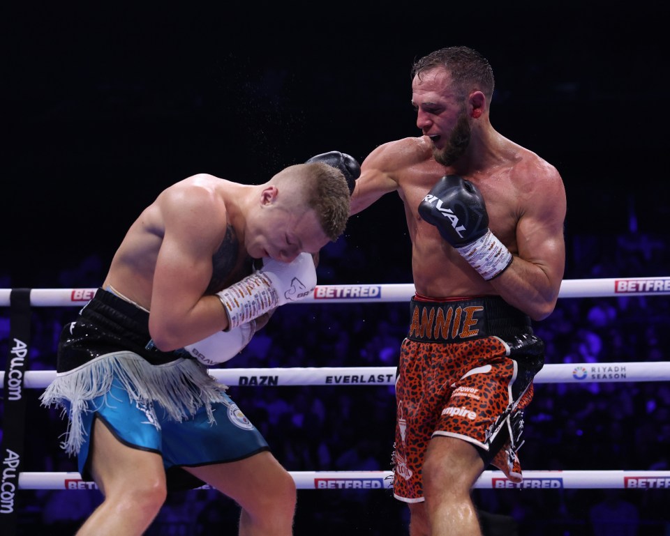 MANCHESTER, ENGLAND - OCTOBER 26: James Flint (Orange Shorts) and Campbell Hatton (Blue shorts) during their Super Lightweight contest at Co-op Live on October 26, 2024 in Manchester, England. (Photo by Mark Robinson/Matchroom Boxing/Getty Images)