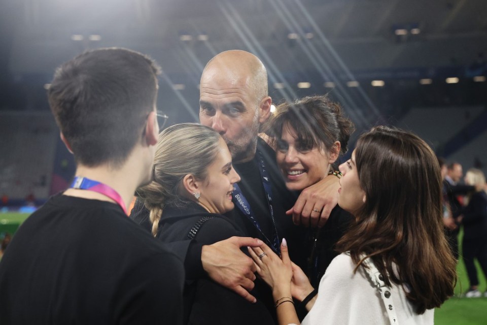 ISTANBUL, TURKEY - JUNE 10: Pep Guardiola, Manager of Manchester City, celebrates with his wife Cristina Serra and his daughter Maria Guardiola after the team's victory in the UEFA Champions League 2022/23 final match between FC Internazionale and Manchester City FC at Atatuerk Olympic Stadium on June 10, 2023 in Istanbul, Turkey. (Photo by Alexander Hassenstein - UEFA/UEFA via Getty Images)