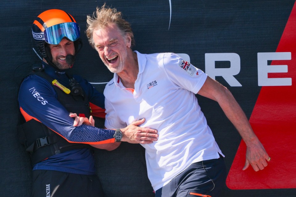 Ben Ainslie and Ratcliffe celebrating with the Louis Vuitton Cup after beating Italy