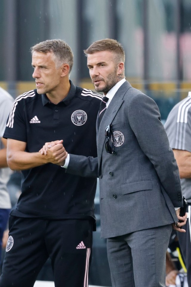 FORT LAUDERDALE, FLORIDA - MAY 12: Head coach Phil Neville of Inter Miami CF talks with owner David Beckham prior to the game against CF Montreal at DRV PNK Stadium on May 12, 2021 in Fort Lauderdale, Florida. (Photo by Michael Reaves/Getty Images)