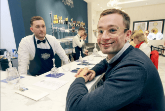 The marbled bar is staffed by posh waiters in bow ties