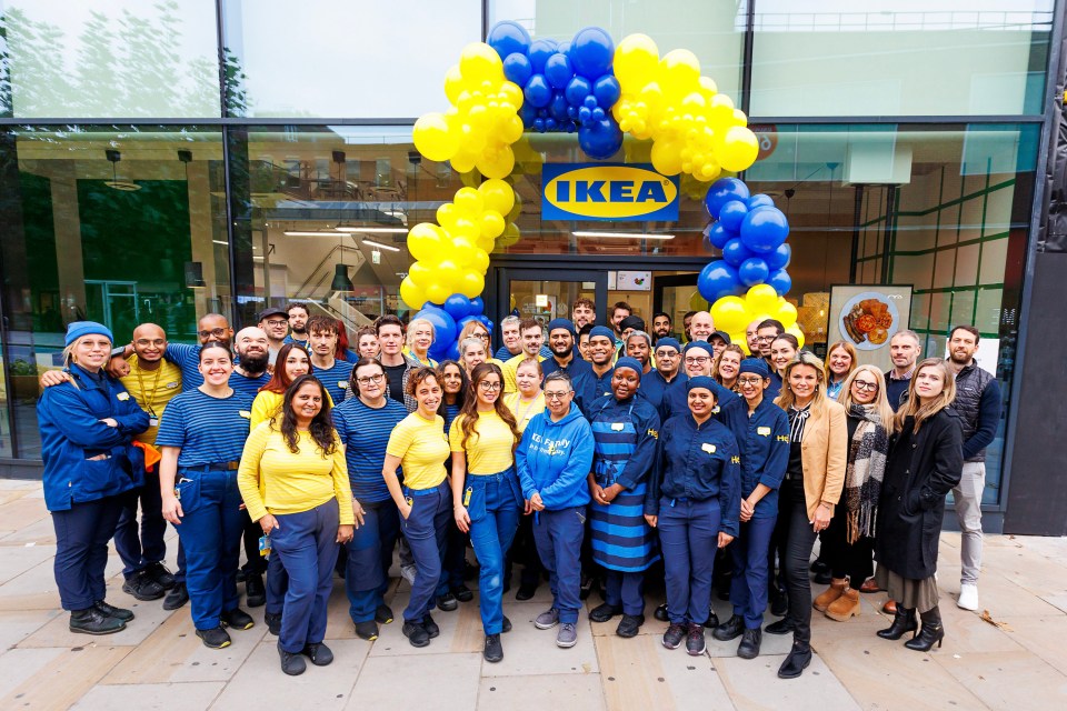 Staff from the new restaurant opening the store yesterday