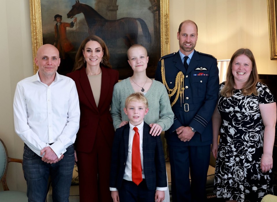 She was pictured alongside Liz at Windsor Castle, as well as her husband Prince William