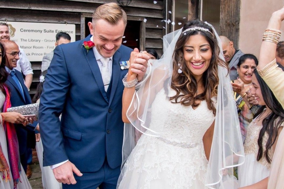 Rob and Anu on their wedding day when Anu was pregnant