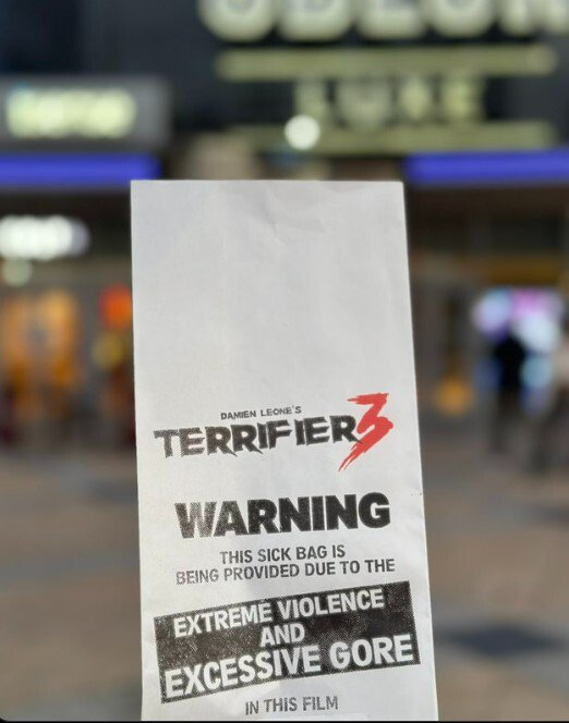 a warning sign for the movie terrifier 3