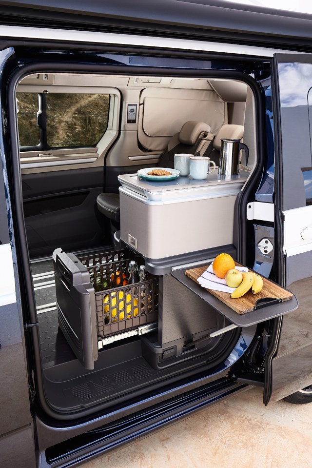 The entry level camper has a compact mini-kitchen with a single gas hob that extends from the rear when the boot is open