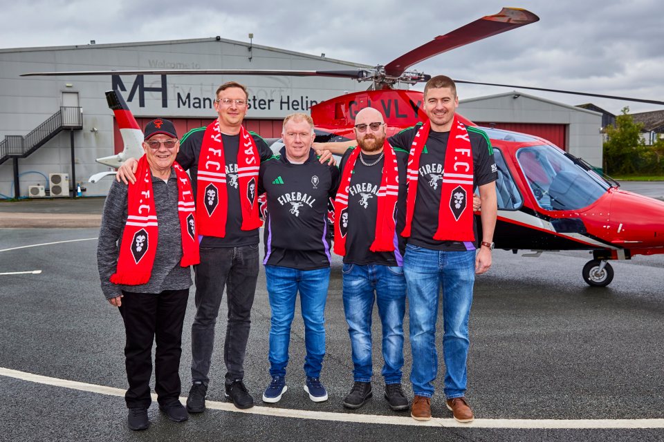 Paul Scholes surprised four Salford City fans with a helicopter ride to and from Newport