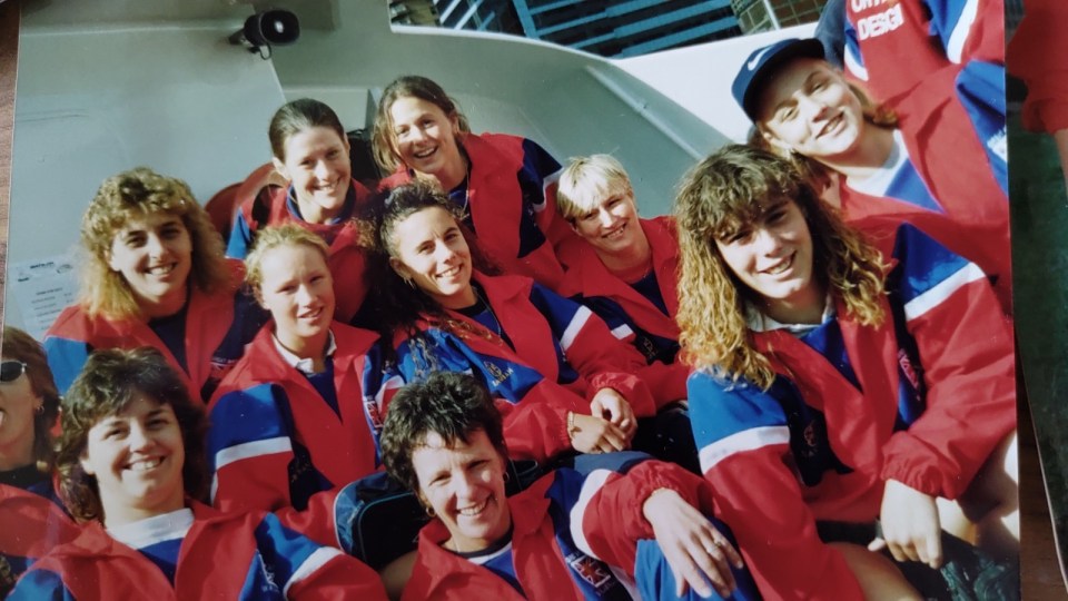 a group of women wearing red and blue jackets with the word usa on them