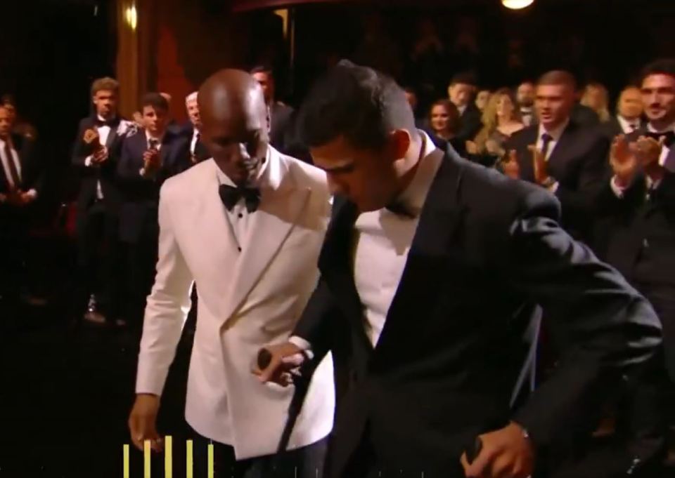 Rodri was escorted to his trophy by host and Chelsea legend Didier Drogba