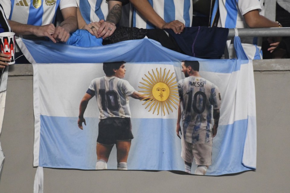 A flag of Diego Maradona and  Messi was displayed during the match