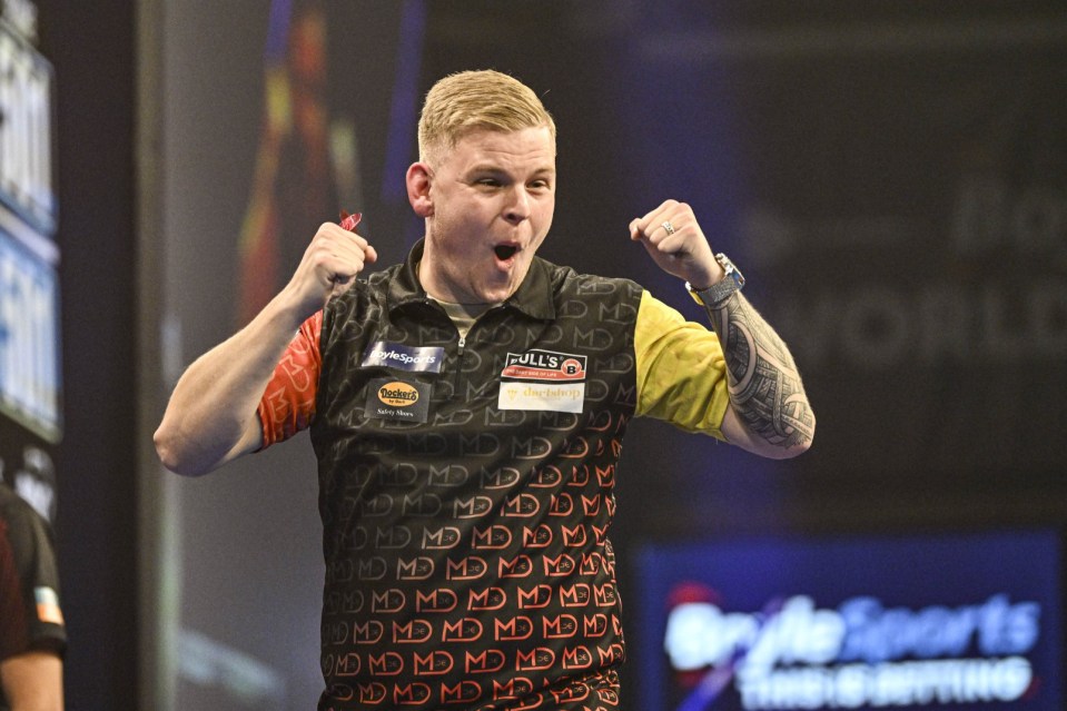 Mandatory Credit: Photo by Godfrey Pitt/Action Plus/REX/Shutterstock (14778069ag) Mike De Decker celebrates after hitting the winning double to win the match against Luke Humphries; 13th October 2024, Mattioli Arena, Leicester, England; 2024 PDC BoyleSports World Grand Prix Darts Final. World Grand Prix Darts, Mattioli Arena, Leicester, UK - 13 Oct 2024