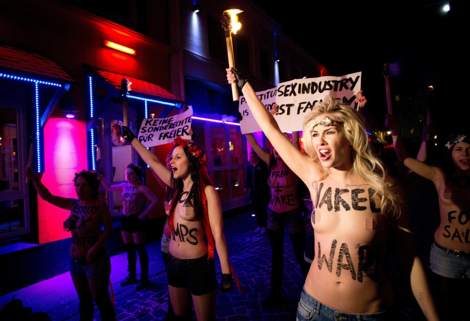 Activists Femen protesting against prostitution and the sex industry in Herbertstrasse on the Reeperbahn in Hamburg, Germany, in January 2013