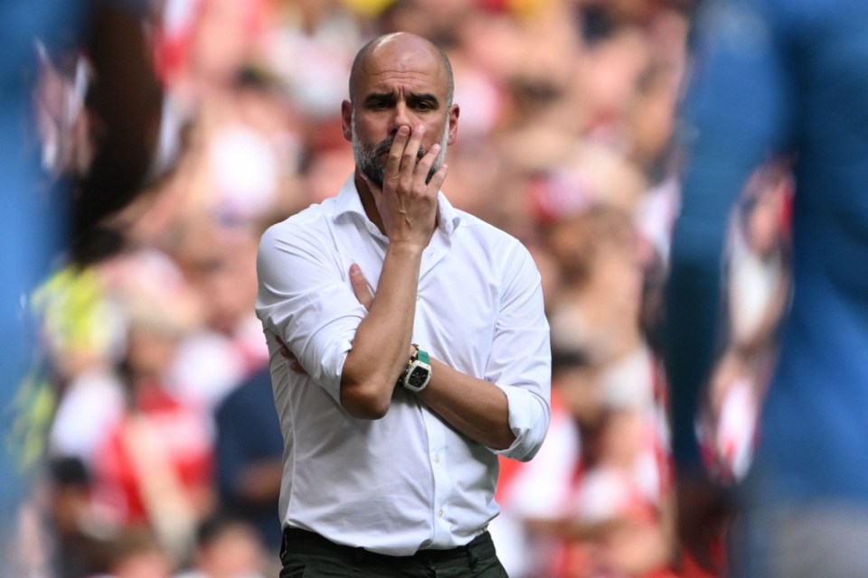 Manchester City's Spanish manager Pep Guardiola gestures on the touchline during the English FA Community Shield football match between Arsenal and Manchester City at Wembley Stadium, in London, August 6, 2023. (Photo by JUSTIN TALLIS / AFP) / NOT FOR MARKETING OR ADVERTISING USE / RESTRICTED TO EDITORIAL USE (Photo by JUSTIN TALLIS/AFP via Getty Images)