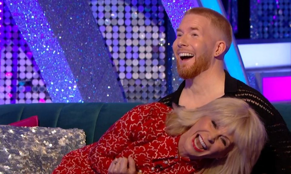 She then collapsed in laughter while Neil Jones looked bemused