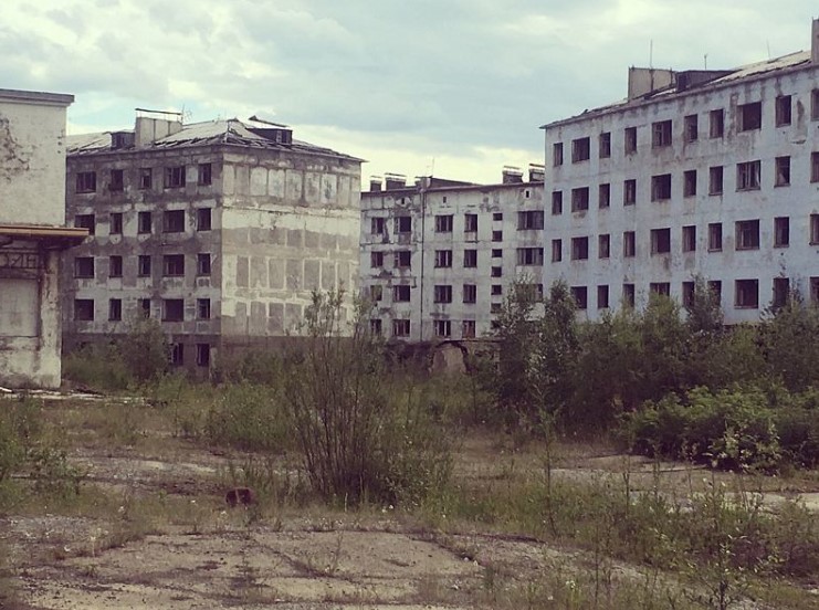 a row of buildings with one that says ' cccp ' on it