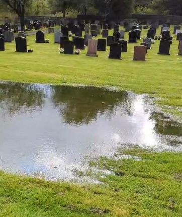 Parts of the cemetery are left with deep pools of water whenever it rains