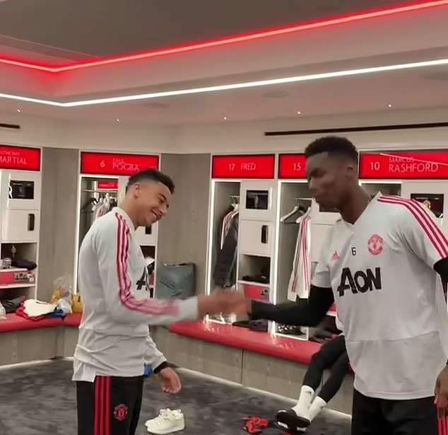 Jesse Lingard and Paul Pogba dancing in the Man Utd dressing room