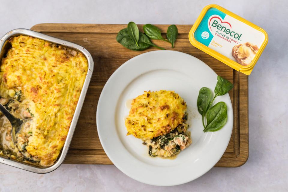 a casserole dish next to a plate of food and benecol butter