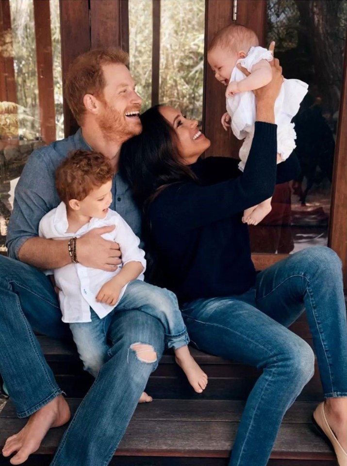 Harry and Meghan looking happy with Archie and Lilibet at Christmas 2021