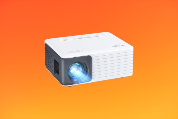 a voton projector is sitting on an orange background