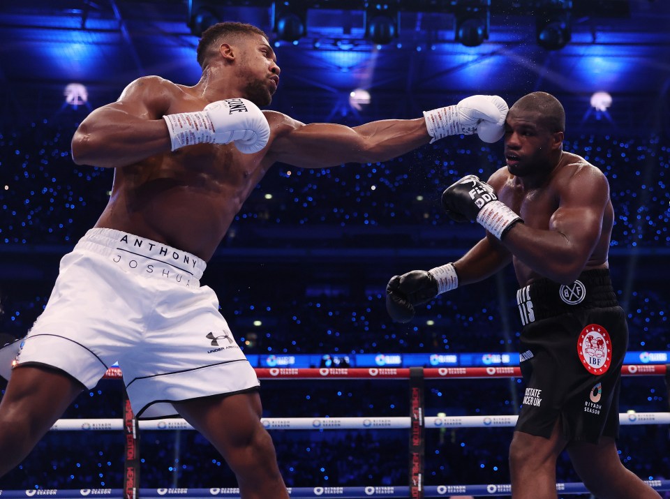 anthony joshua is wearing a pair of under armour shorts