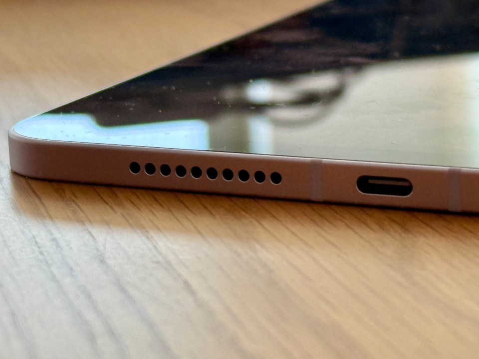 There's a USB-C port on the bottom and a Touch ID fingerprint scanner at the top