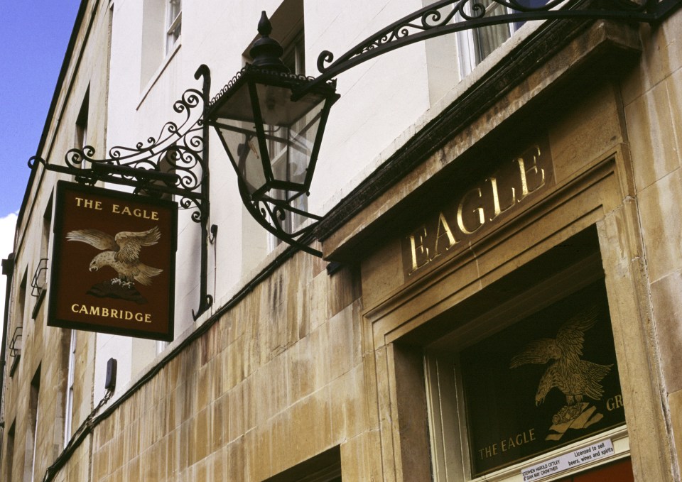 a building with a sign that says the eagle cambridge