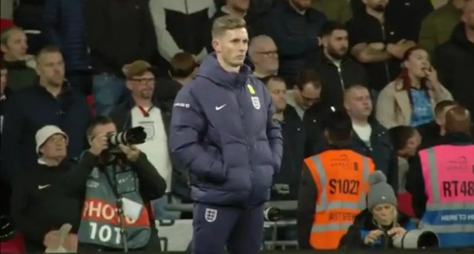 Dean Henderson stood alone during the minute's silence at Wembley