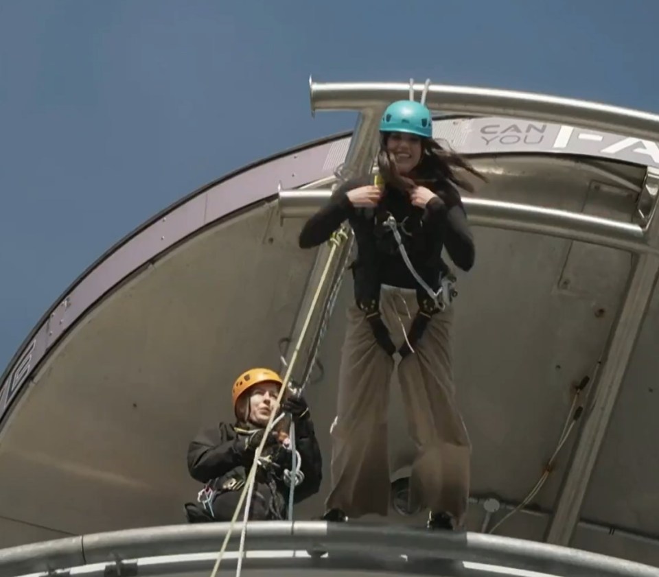 The 36-year-old smiled and screamed 'to dare is to do' as she leapt off the stadium