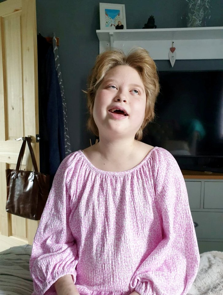 Portrait of Bella Mildon, a blind autistic child.