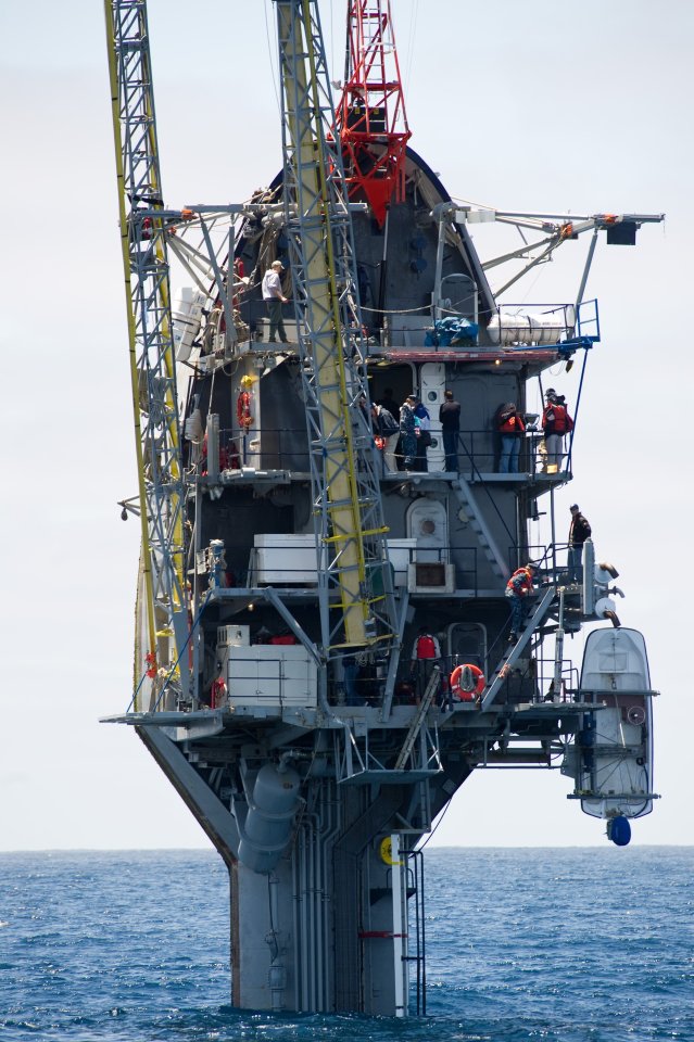 a large ship is in the middle of the ocean