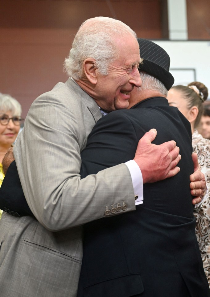 Charles embracing Uncle James Michael ‘Widdy’ Welsh