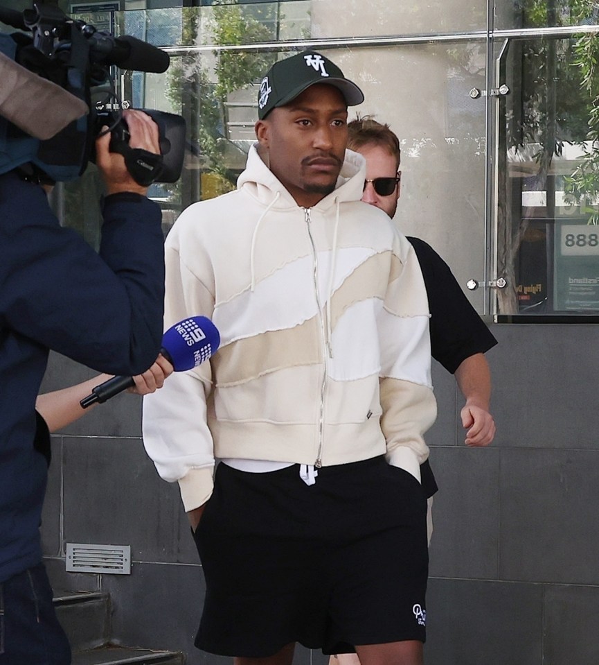 Rapper Yung Filly, 29, dodges cameras outside Perth Police station on Saturday