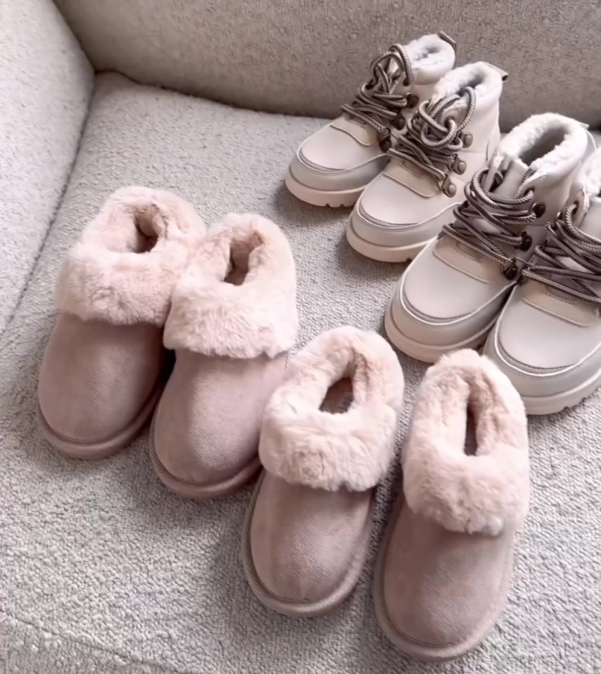 three pairs of shoes are sitting on a white couch