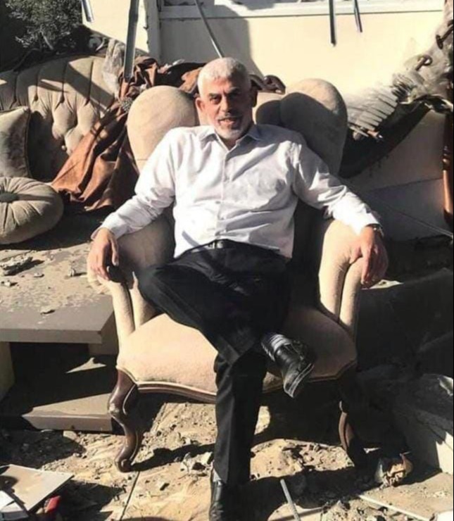 Hamas leader in Gaza Yahya Sinwar sits in his bombed Gaza office, May 27, 2021