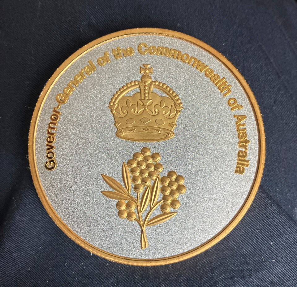 a gold and silver coin that says governor general of the commonwealth of australia