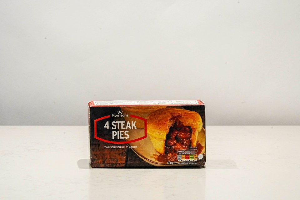 a box of morrisons 4 steak pies sits on a white surface