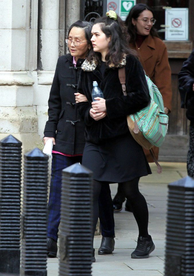 Tan with her daughter Rebecca leaving court