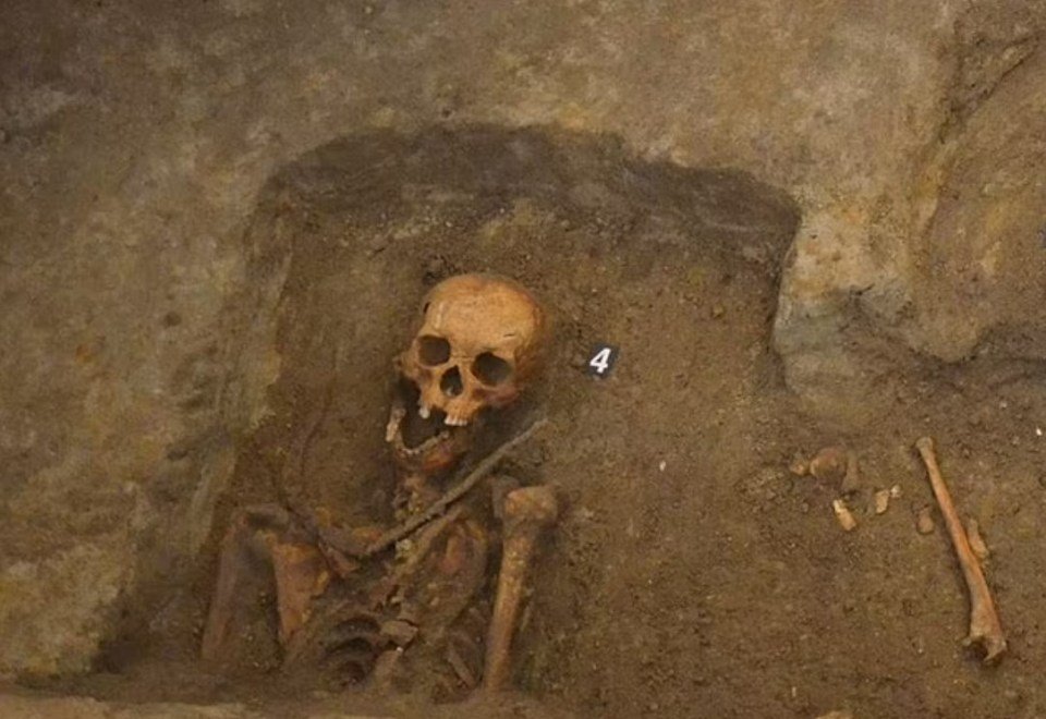 The remains of a child found in a vampire tomb were also found in Poland with a sickle around its neck