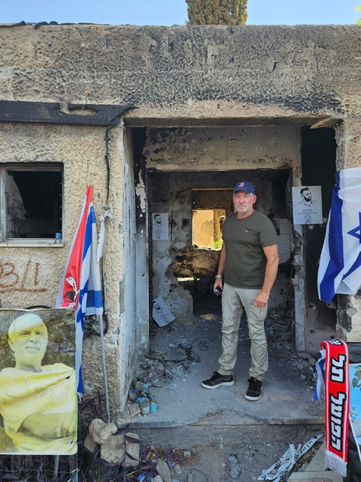 Chris at the site of a Kibbutz that was set on fire on October 7