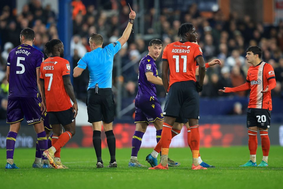 Walsh was shown a straight red card by referee James Bell