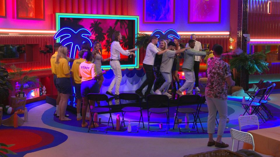 Big Brother contestants enjoy the Conga during Series 2, Episode 5