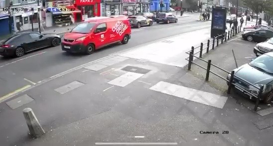 The car narrowly avoided crashing into other pedestrians