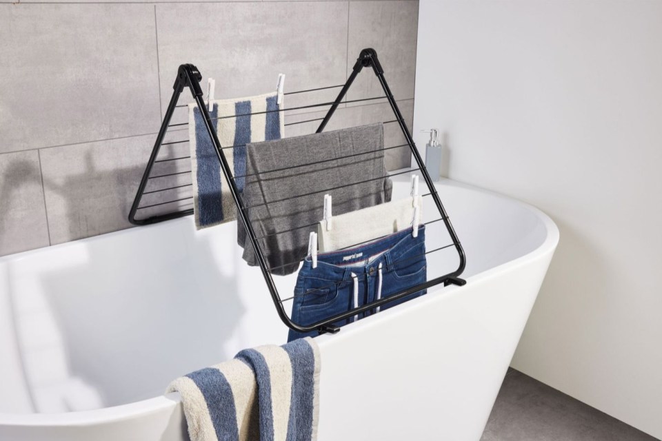 The airer stands over the bath and doesn't take up space in a room